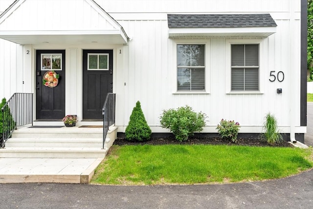 50 Frankfort St Unit 1, Fitchburg, MA 01420 - view of exterior entry featuring a shingled roof