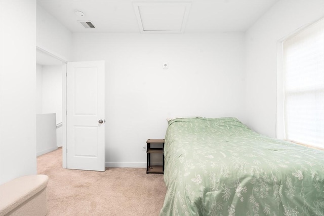 50 Frankfort St Unit 1, Fitchburg, MA 01420 - bedroom featuring carpet, attic access, and baseboards