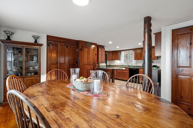 dining area with light wood-type flooring