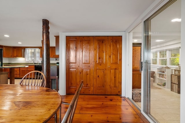 dining area with light hardwood / wood-style floors