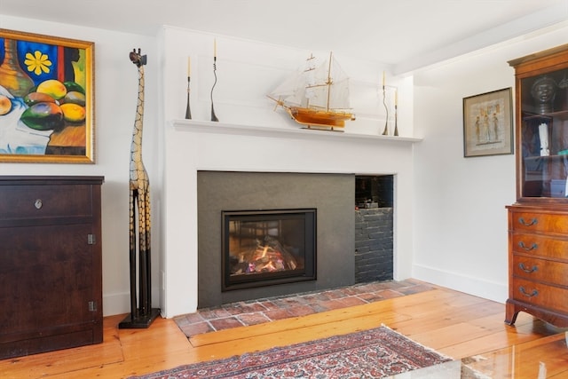 interior details featuring hardwood / wood-style flooring