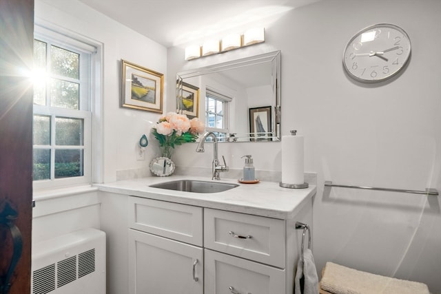 bathroom featuring vanity and a healthy amount of sunlight