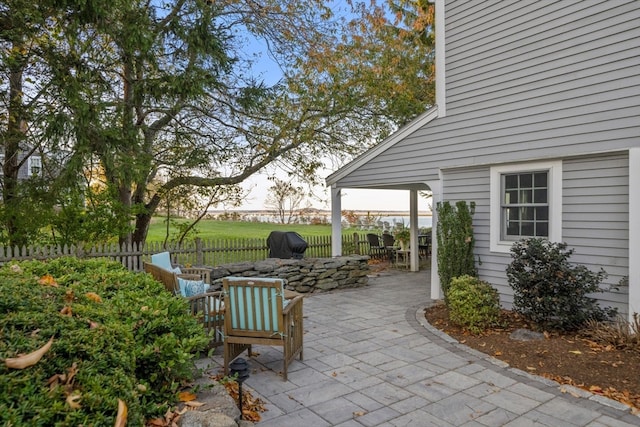 view of patio with a fire pit