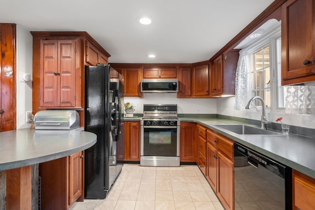 kitchen with black appliances and sink