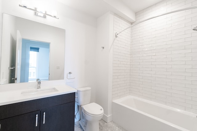 full bathroom with tile patterned floors, toilet, vanity, and tiled shower / bath