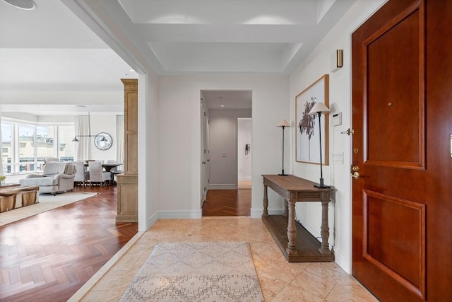 foyer with light parquet flooring