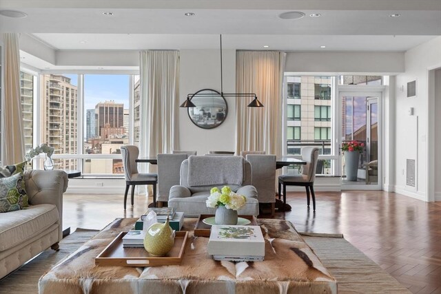 living room featuring parquet floors