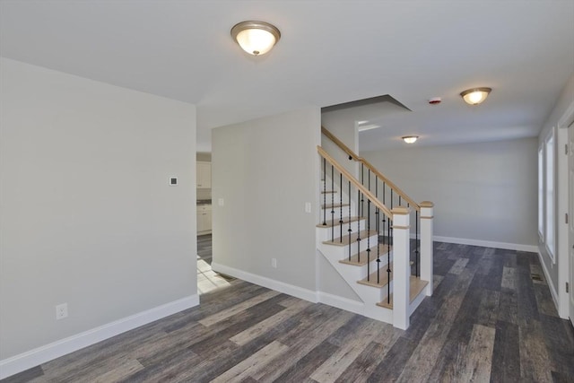 staircase featuring hardwood / wood-style flooring