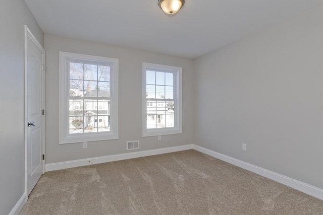 empty room with light carpet