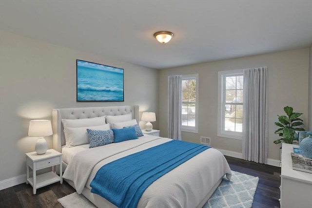 bedroom featuring dark hardwood / wood-style floors