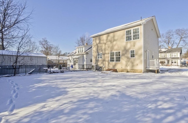 view of snow covered house