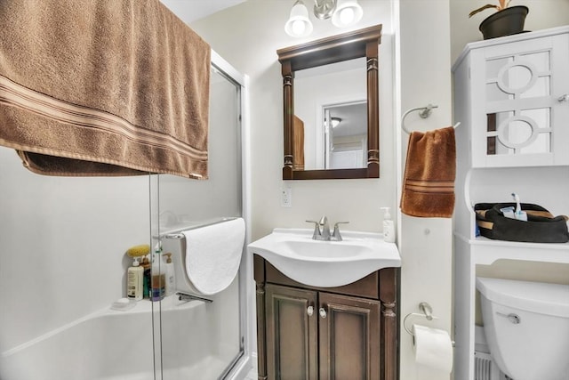 bathroom with toilet and vanity