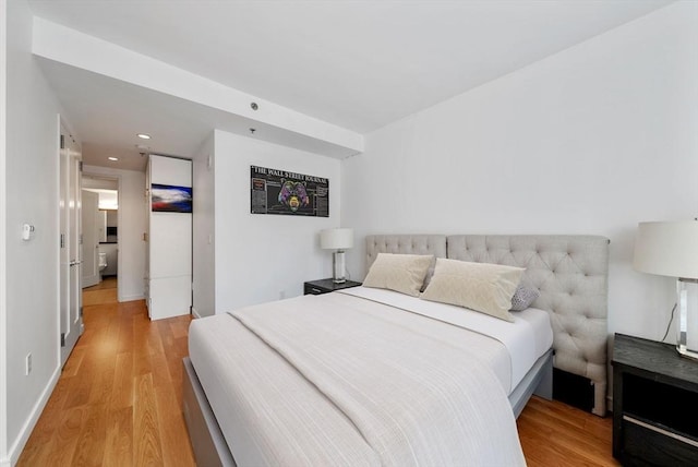 580 Washington St Unit 901, Boston, MA 02111 - bedroom with light wood-style flooring, recessed lighting, and baseboards