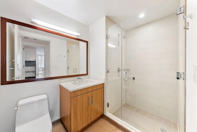 580 Washington St Unit 901, Boston, MA 02111 - bathroom with a stall shower, vanity, toilet, tile patterned flooring, and recessed lighting