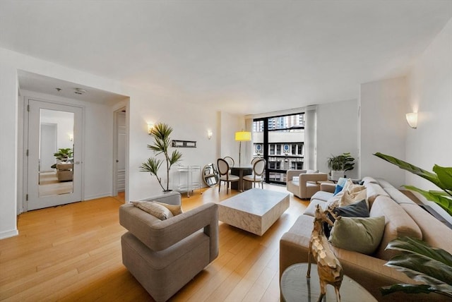 580 Washington St Unit 901, Boston, MA 02111 - living area featuring light wood-style flooring