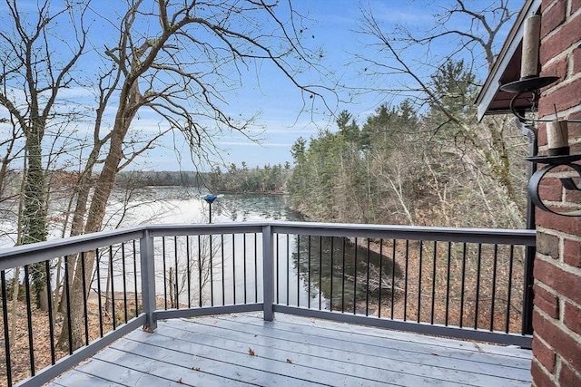 deck featuring a water view