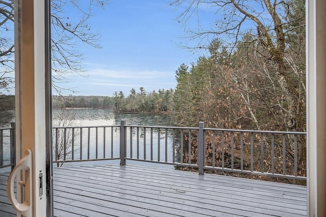 deck featuring a water view