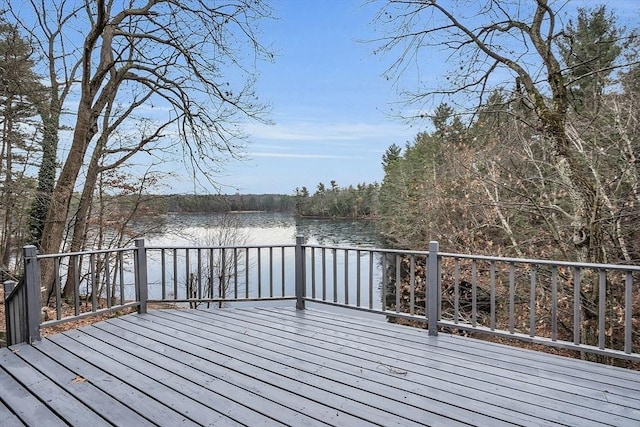 wooden terrace with a water view