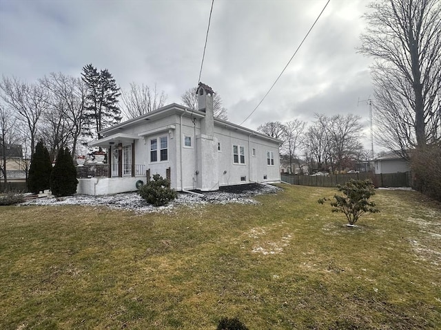 view of property exterior featuring a yard
