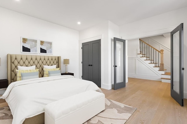 7 Bennett St, Natick, MA 01760 - bedroom with light wood-style floors, recessed lighting, and a closet