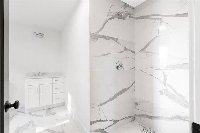 7 Bennett St, Natick, MA 01760 - bathroom with marble tiled floors, a marble finish shower, and vanity