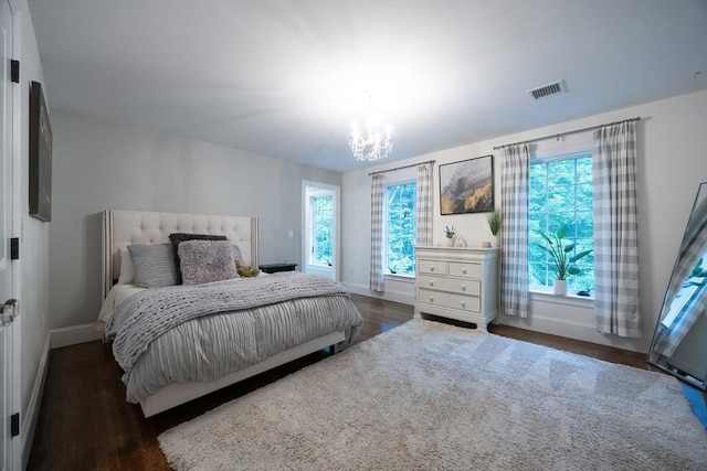 5 Copperbeech Cir, Westborough, MA 01581 - bedroom featuring a chandelier, baseboards, and wood finished floors