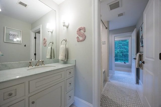 5 Copperbeech Cir, Westborough, MA 01581 - full bath with vanity, baseboards, tile patterned floors, and shower / bath combo