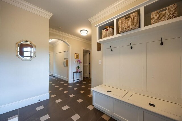 5 Copperbeech Cir, Westborough, MA 01581 - mudroom with arched walkways, baseboards, crown molding, and dark floors