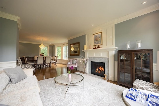 5 Copperbeech Cir, Westborough, MA 01581 - living room featuring wood finished floors, ornamental molding, a premium fireplace, and recessed lighting