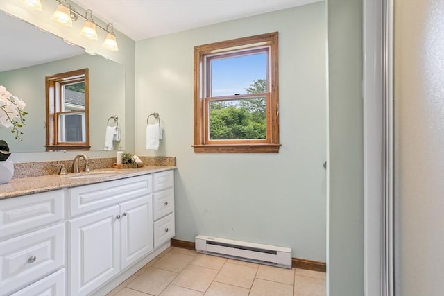 52 Diana Dr, Marlborough, MA 01752 - bathroom with a baseboard radiator, vanity, and tile patterned floors