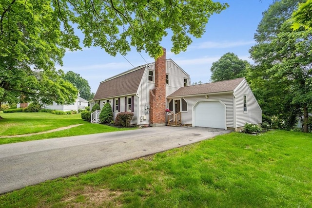 52 Diana Dr, Marlborough, MA 01752 - colonial inspired home featuring a garage, asphalt driveway, a chimney, a front yard, and a shingled roof