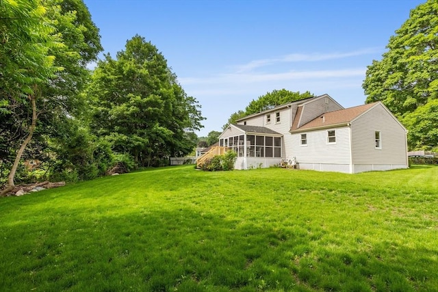 52 Diana Dr, Marlborough, MA 01752 - view of green lawn featuring a sunroom
