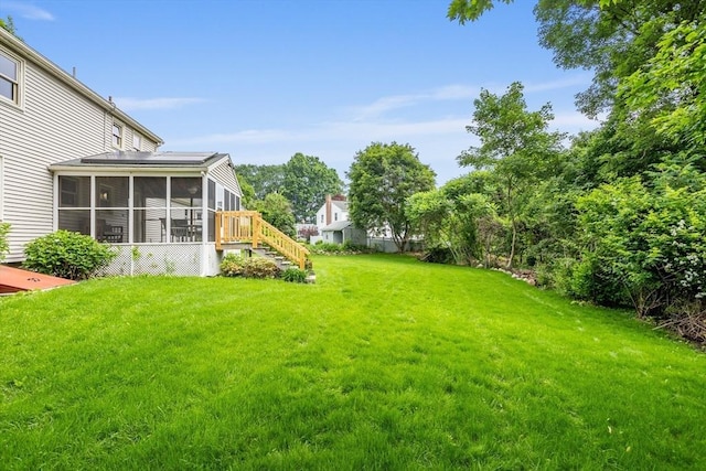 52 Diana Dr, Marlborough, MA 01752 - view of grassy yard with a sunroom