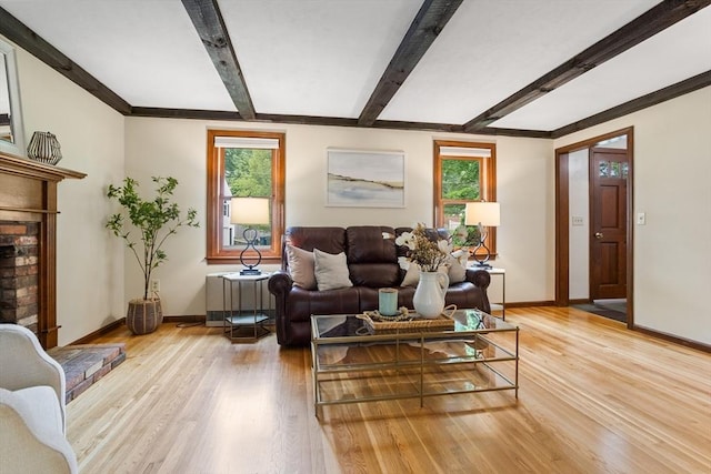 52 Diana Dr, Marlborough, MA 01752 - living area with light wood finished floors and beamed ceiling