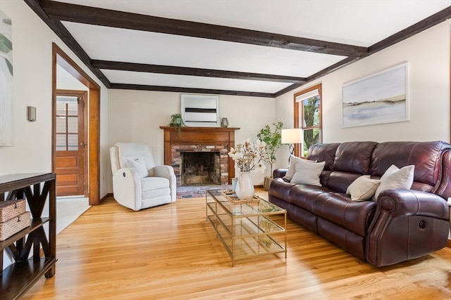 52 Diana Dr, Marlborough, MA 01752 - living area with light wood-type flooring, a fireplace, beamed ceiling, and crown molding