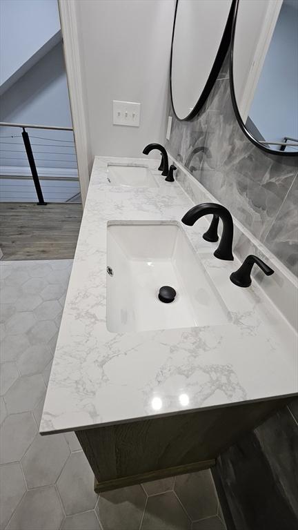 bathroom featuring vanity and tile patterned flooring