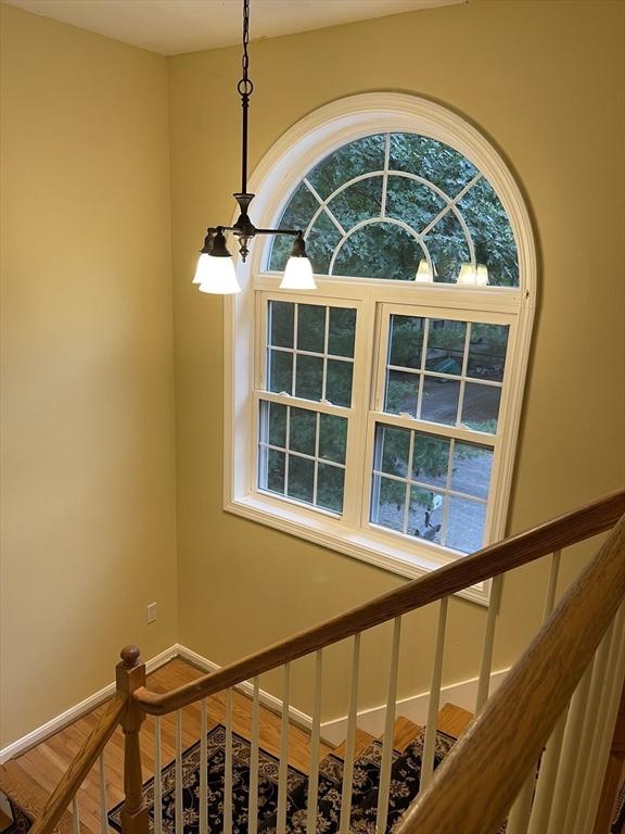 24A Outlook Dr Unit A, Worcester, MA 01602 - staircase with wood finished floors and baseboards