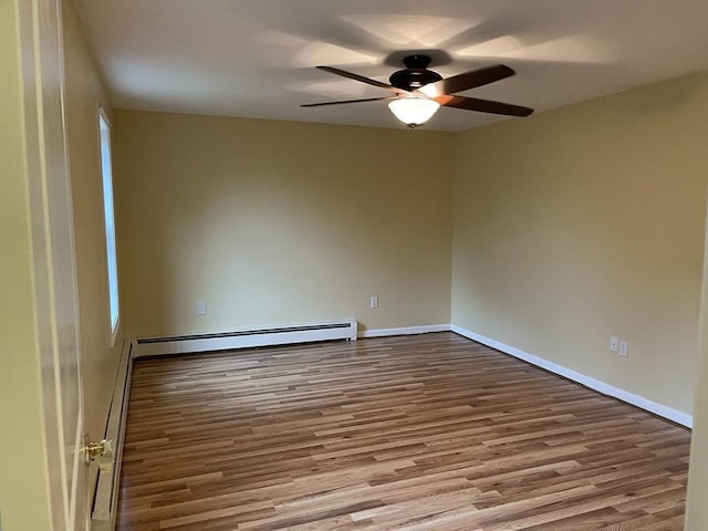 24A Outlook Dr Unit A, Worcester, MA 01602 - empty room with a baseboard heating unit, wood finished floors, and ceiling fan