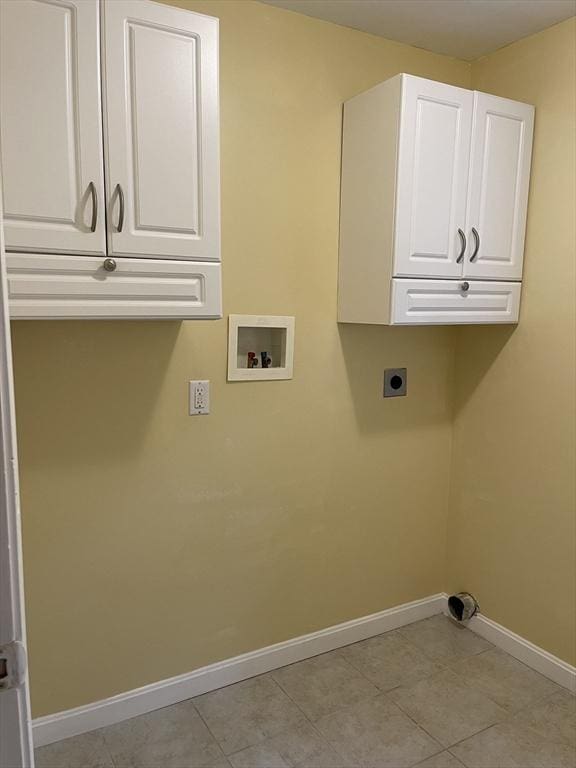 24A Outlook Dr Unit A, Worcester, MA 01602 - laundry area featuring cabinet space, electric dryer hookup, washer hookup, and light tile patterned floors