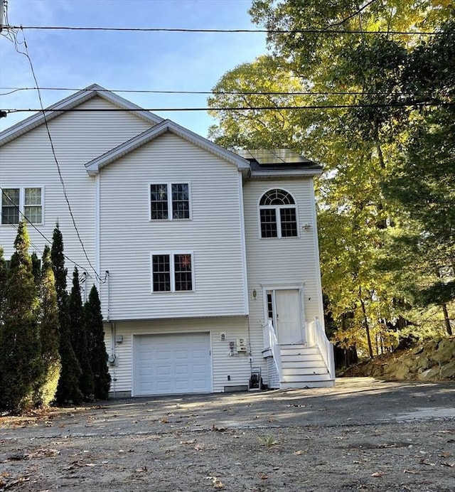 24A Outlook Dr Unit A, Worcester, MA 01602 - view of front of house with a garage and driveway