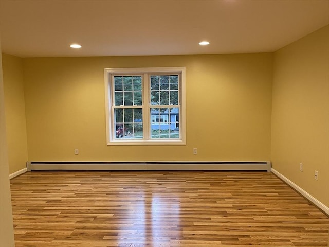 24A Outlook Dr Unit A, Worcester, MA 01602 - unfurnished room with wood finished floors, a baseboard heating unit, and recessed lighting