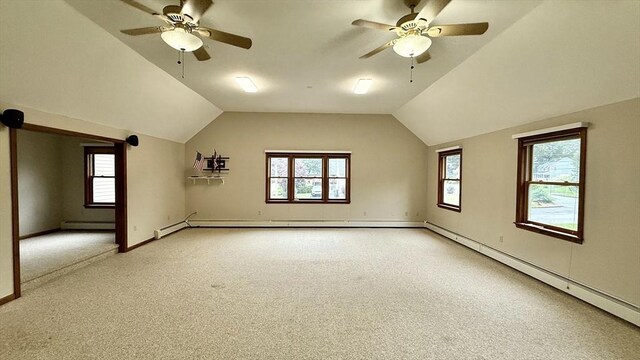 61 Bernice Ave, Leominster, MA 01453 - unfurnished room featuring ceiling fan, light carpet, a baseboard radiator, baseboard heating, and vaulted ceiling