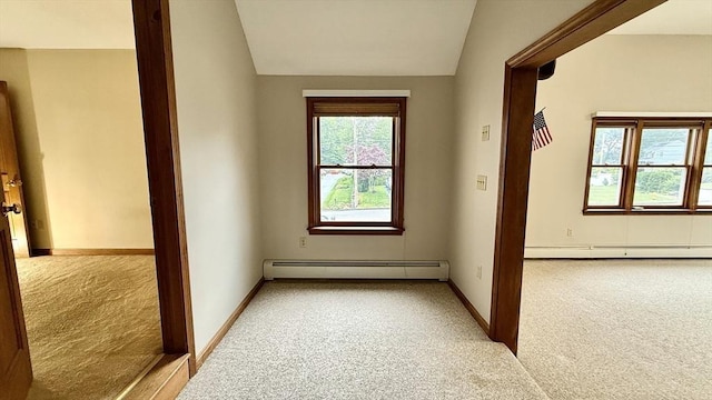 61 Bernice Ave, Leominster, MA 01453 - hallway featuring light colored carpet, a baseboard radiator, a baseboard heating unit, and vaulted ceiling