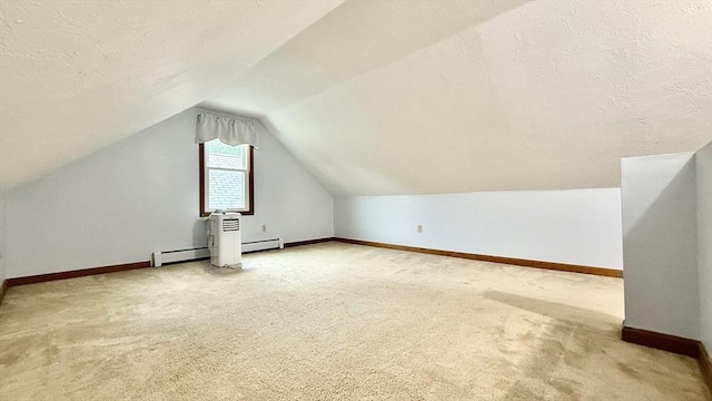 61 Bernice Ave, Leominster, MA 01453 - bonus room with carpet, lofted ceiling, a baseboard radiator, and a textured ceiling