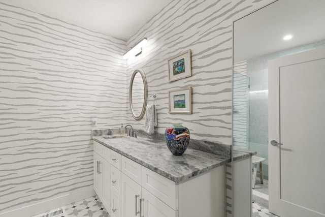 16 Primrose Ln Unit 16, Ipswich, MA 01938 - bathroom with wallpapered walls and vanity