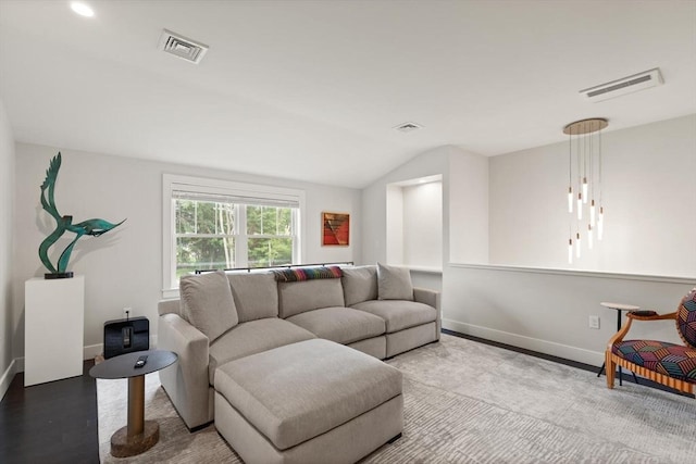 16 Primrose Ln Unit 16, Ipswich, MA 01938 - living area featuring vaulted ceiling and wood finished floors