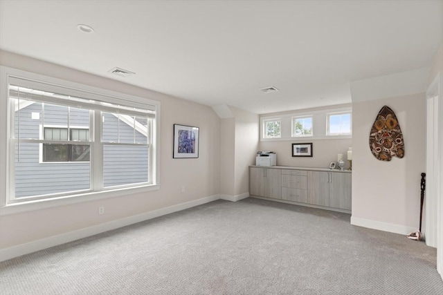 16 Primrose Ln Unit 16, Ipswich, MA 01938 - empty room with light colored carpet and baseboards
