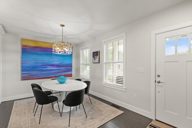16 Primrose Ln Unit 16, Ipswich, MA 01938 - dining room with dark wood-style flooring and a chandelier