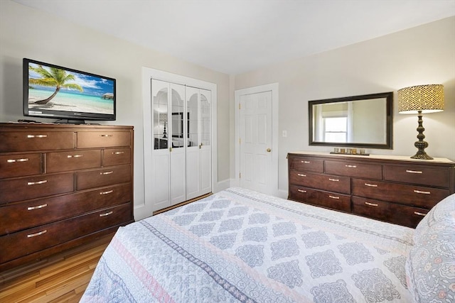 bedroom featuring wood finished floors