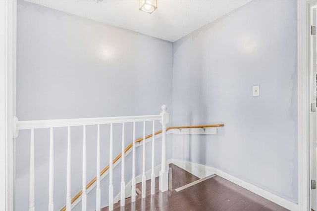 19 Doane Unit 1, Lowell, MA 01851 - stairs featuring wood finished floors and baseboards